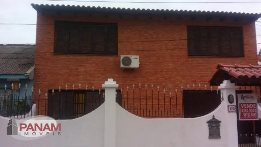 Foto 1 de Sobrado com 4 Quartos à venda, 260m² em Santa Maria Goretti, Porto Alegre