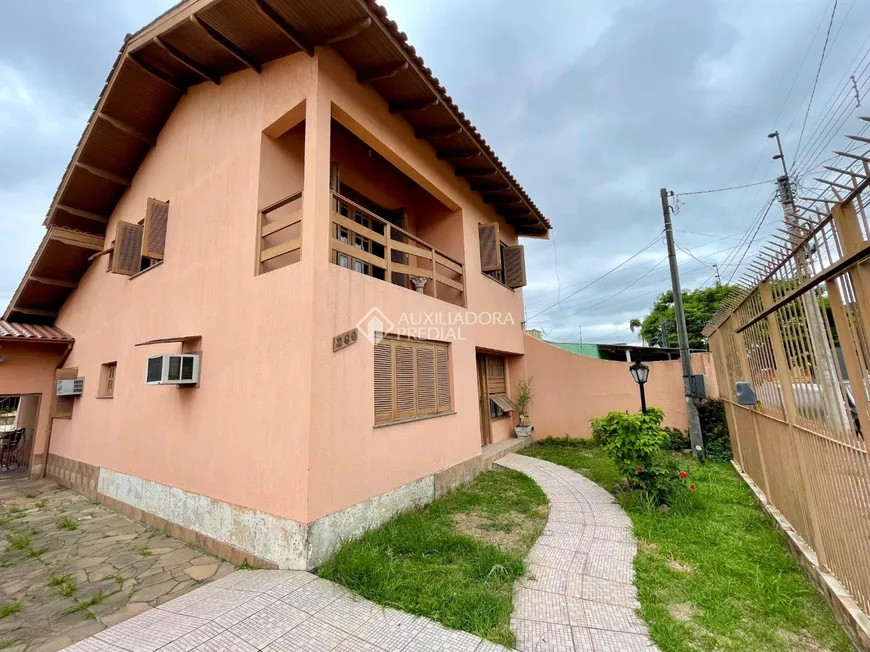 Foto 1 de Sobrado com 4 Quartos à venda, 220m² em Rio Branco, Canoas
