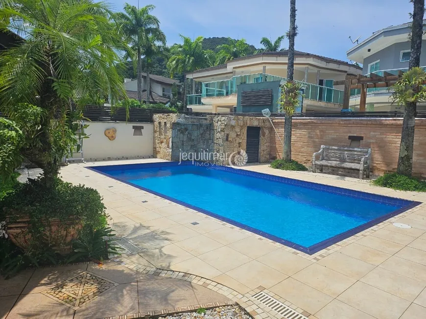 Foto 1 de Casa de Condomínio com 3 Quartos para alugar, 250m² em Balneário Praia do Pernambuco, Guarujá