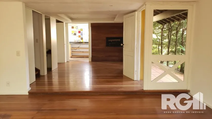 Foto 1 de Casa de Condomínio com 3 Quartos à venda, 219m² em Cavalhada, Porto Alegre