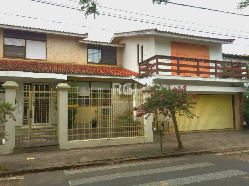 Foto 1 de Casa com 4 Quartos à venda, 341m² em Jardim Lindóia, Porto Alegre