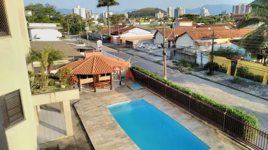 Foto 1 de Apartamento com 1 Quarto à venda, 50m² em Martim de Sa, Caraguatatuba