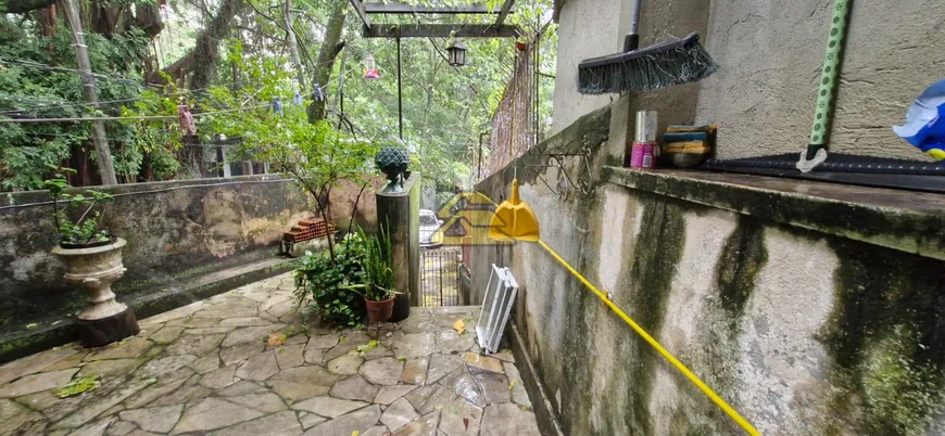 Foto 1 de Casa com 3 Quartos à venda, 112m² em Laranjeiras, Rio de Janeiro