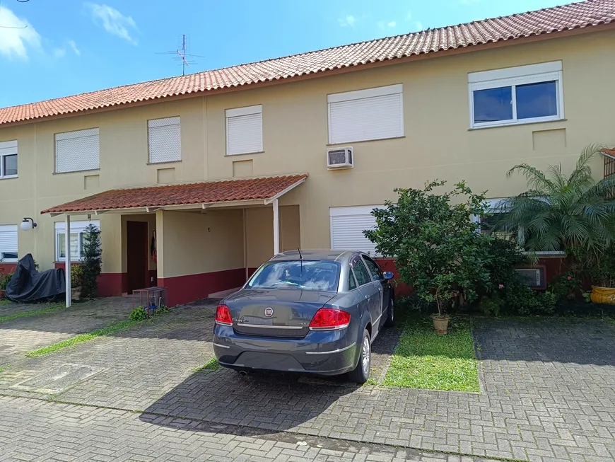 Foto 1 de Casa de Condomínio com 3 Quartos à venda, 90m² em Harmonia, Canoas