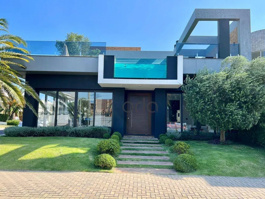 Foto 1 de Casa de Condomínio com 4 Quartos à venda, 350m² em Velas da Marina, Capão da Canoa