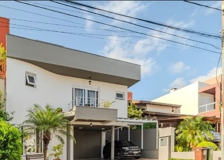 Foto 1 de Casa de Condomínio com 3 Quartos à venda, 301m² em Hípica, Porto Alegre