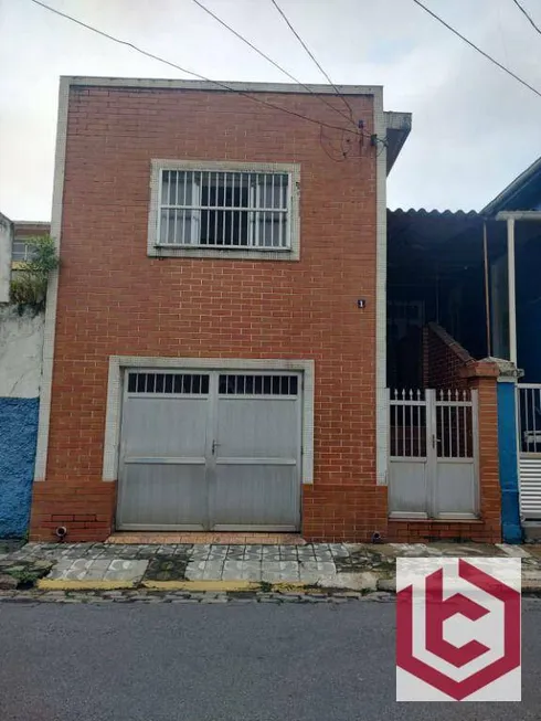 Foto 1 de Casa com 2 Quartos à venda, 65m² em Vila Matias, Santos