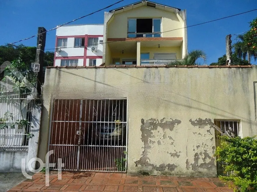 Foto 1 de Casa com 7 Quartos à venda, 539m² em Santo Antônio, Porto Alegre