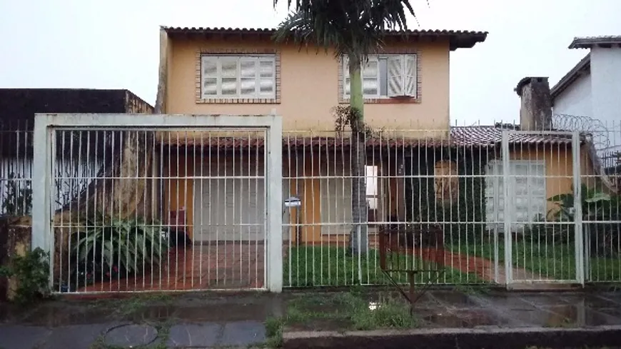 Foto 1 de Casa com 4 Quartos à venda, 275m² em Guarujá, Porto Alegre