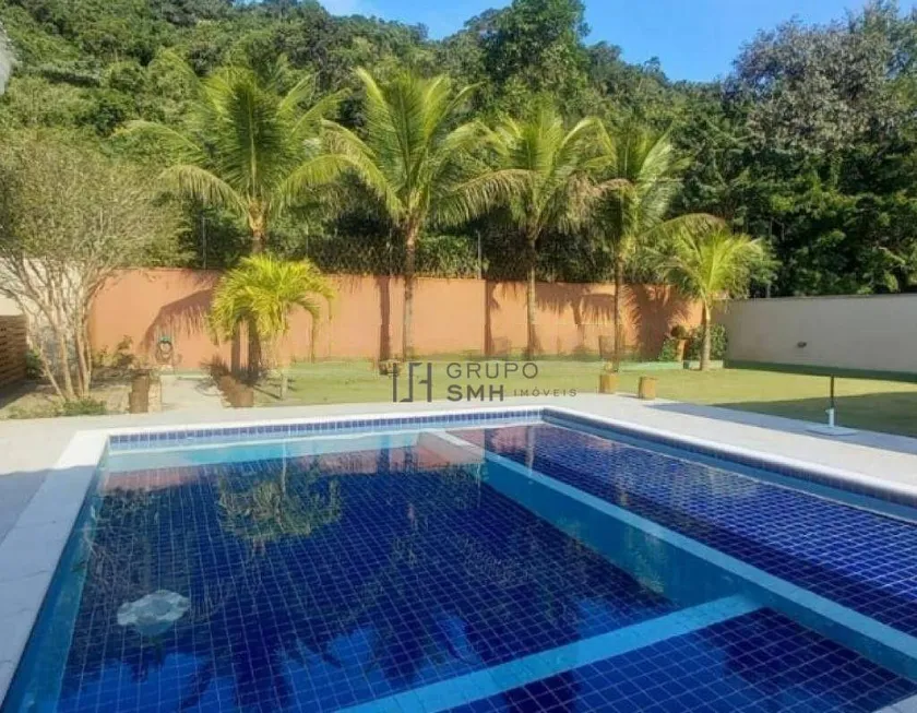 Foto 1 de Casa de Condomínio com 5 Quartos para venda ou aluguel, 700m² em Balneário Praia do Perequê , Guarujá