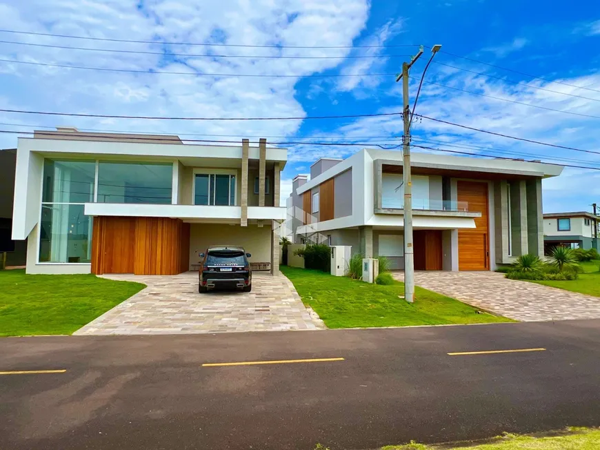 Foto 1 de Casa de Condomínio com 5 Quartos à venda, 430m² em Enseada, Xangri-lá