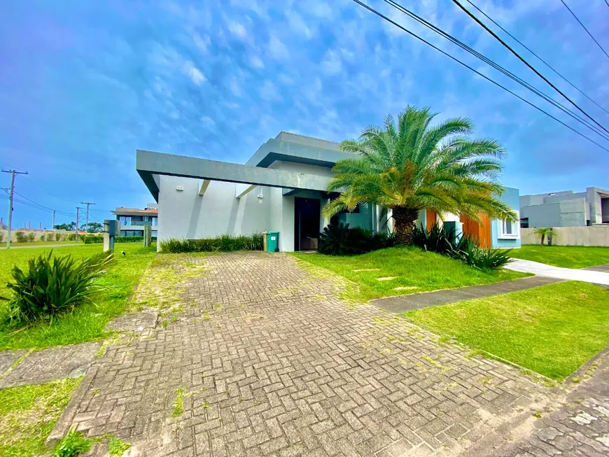 Foto 1 de Casa de Condomínio com 4 Quartos à venda, 185m² em Condominio Capao Ilhas Resort, Capão da Canoa
