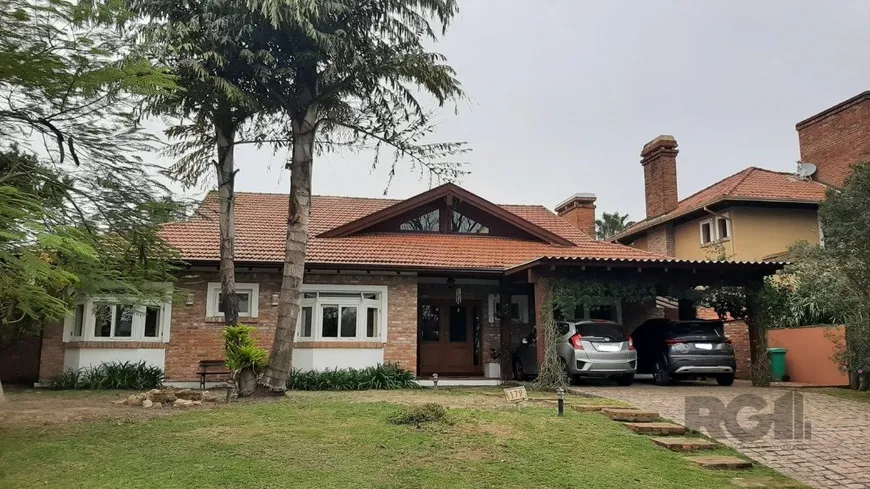 Foto 1 de Casa de Condomínio com 3 Quartos à venda, 259m² em Belém Novo, Porto Alegre