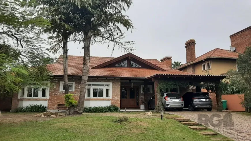 Foto 1 de Casa de Condomínio com 3 Quartos à venda, 261m² em Belém Novo, Porto Alegre