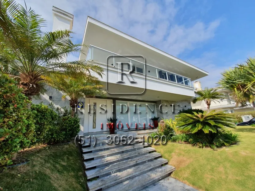 Foto 1 de Casa com 5 Quartos à venda, 1050m² em Jurerê Internacional, Florianópolis