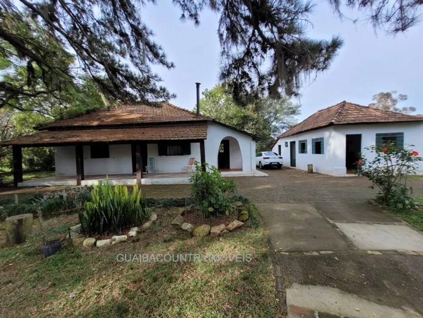 Foto 1 de Fazenda/Sítio com 4 Quartos à venda, 70000m² em Guaíba Country Club, Eldorado do Sul