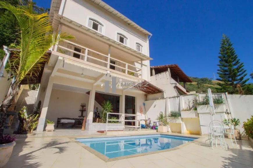 Foto 1 de Casa com 7 Quartos à venda, 330m² em Tijuca, Rio de Janeiro