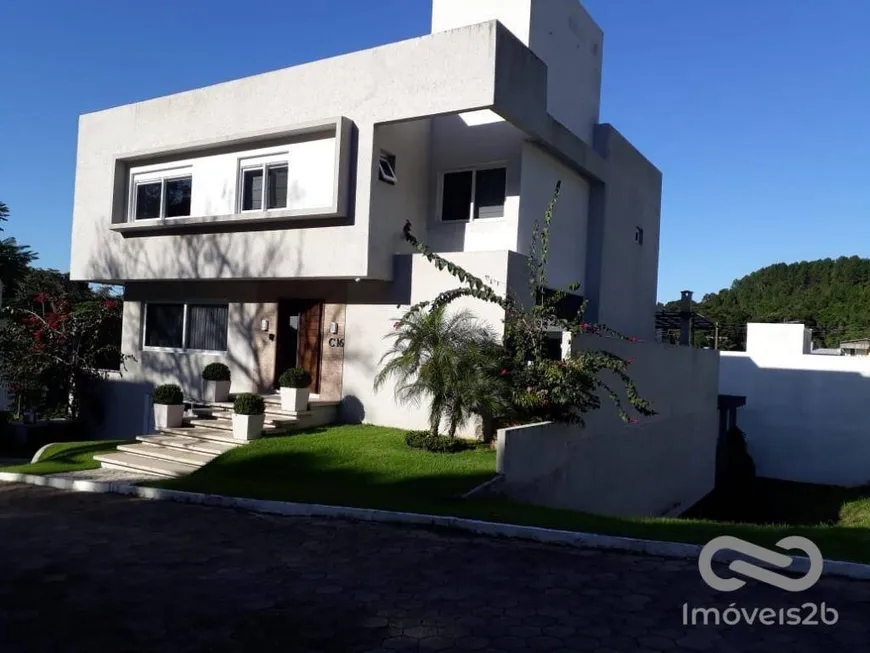 Foto 1 de Casa de Condomínio com 4 Quartos à venda, 370m² em Canasvieiras, Florianópolis