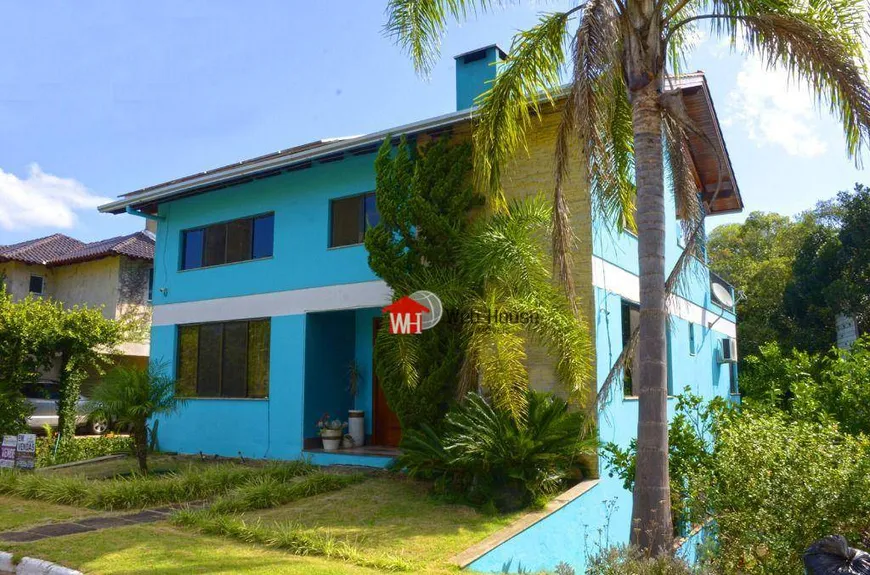 Foto 1 de Casa de Condomínio com 3 Quartos à venda, 345m² em Tarumã, Viamão