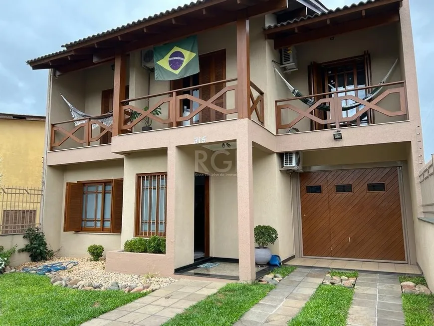 Foto 1 de Casa com 3 Quartos à venda, 273m² em Jardim Itú Sabará, Porto Alegre