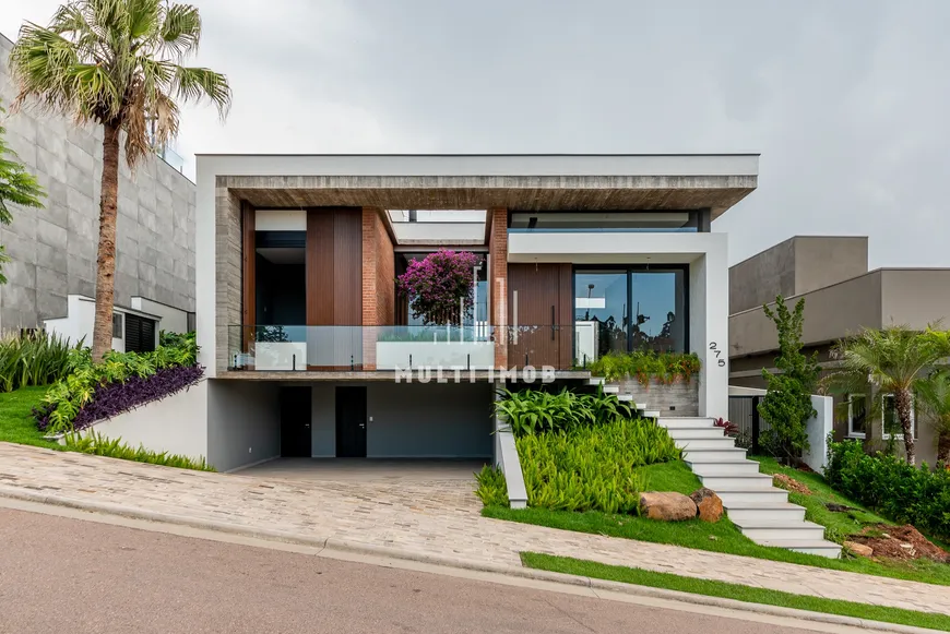 Foto 1 de Casa de Condomínio com 3 Quartos à venda, 300m² em Vila Nova, Porto Alegre