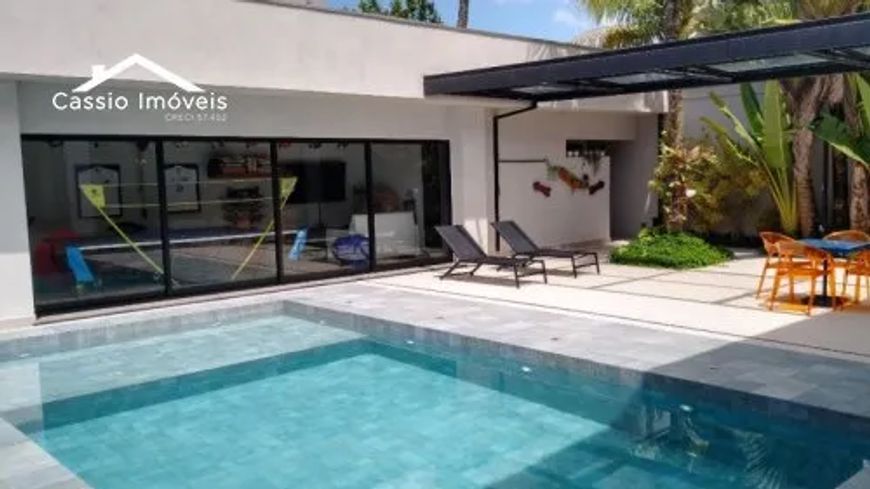 Foto 1 de Casa de Condomínio com 5 Quartos à venda, 380m² em Jardim Acapulco , Guarujá