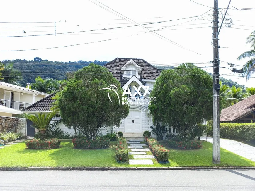 Foto 1 de Casa de Condomínio com 5 Quartos à venda, 347m² em Tabatinga, Caraguatatuba