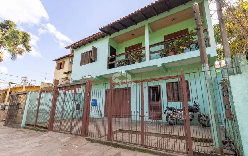 Foto 1 de Casa com 3 Quartos à venda, 276m² em Jardim Itú Sabará, Porto Alegre