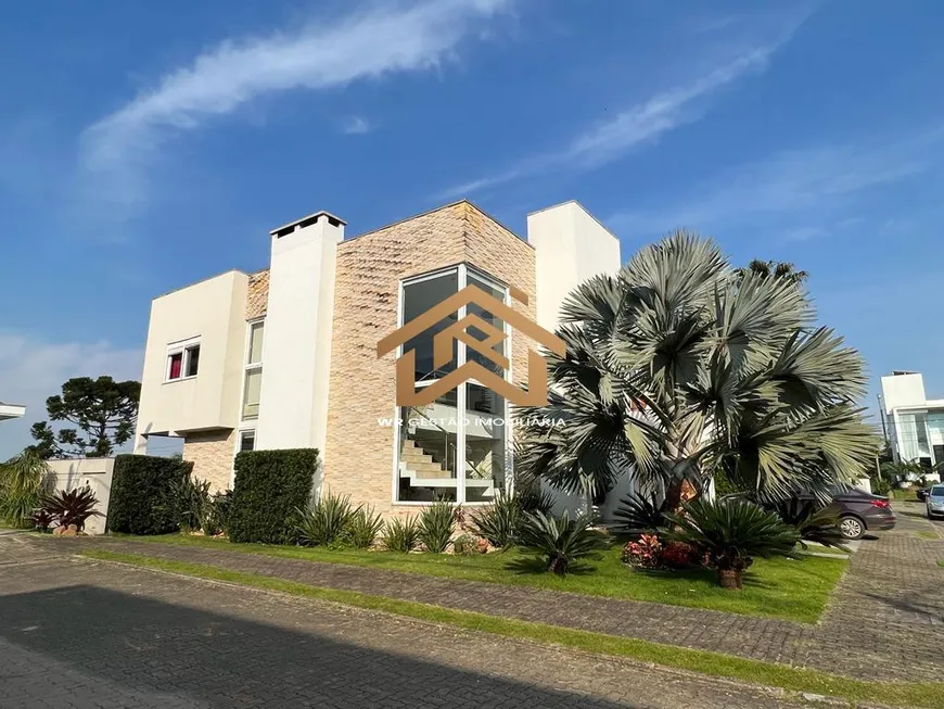 Foto 1 de Casa de Condomínio com 3 Quartos à venda, 450m² em Marechal Rondon, Canoas
