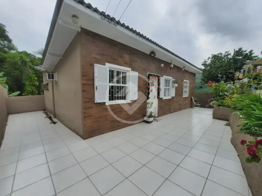 Foto 1 de Casa com 2 Quartos à venda, 81m² em Itacorubi, Florianópolis