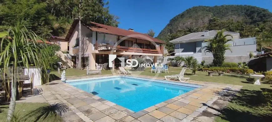 Foto 1 de Casa com 4 Quartos à venda, 290m² em Granja Comary, Teresópolis