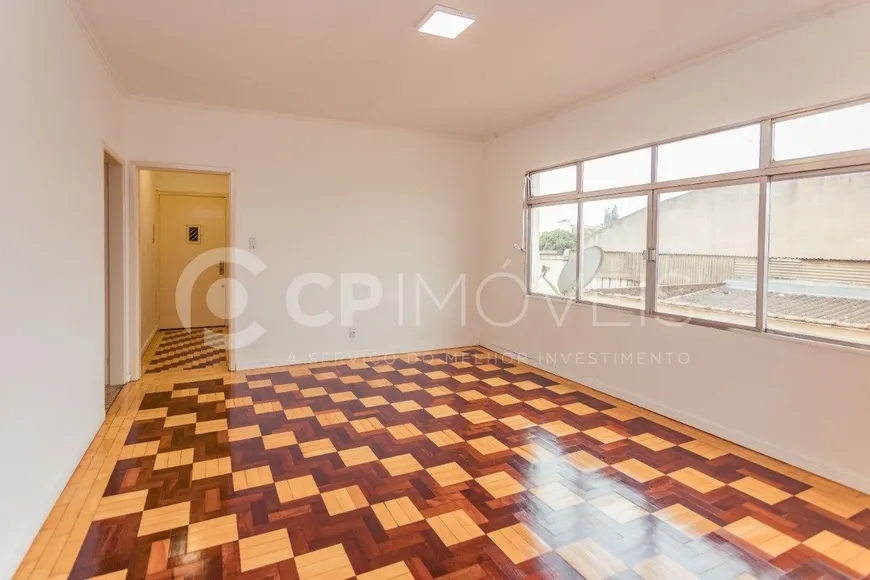 Foto 1 de Apartamento com 4 Quartos à venda, 94m² em Navegantes, Porto Alegre