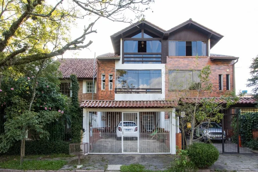Foto 1 de Casa com 3 Quartos à venda, 181m² em Guarujá, Porto Alegre