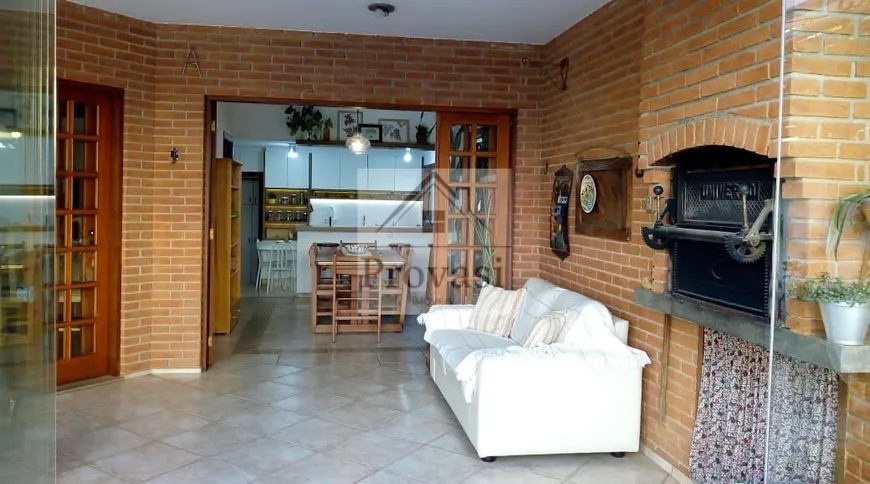 Foto 1 de Casa de Condomínio com 4 Quartos à venda, 453m² em Alphaville, Santana de Parnaíba