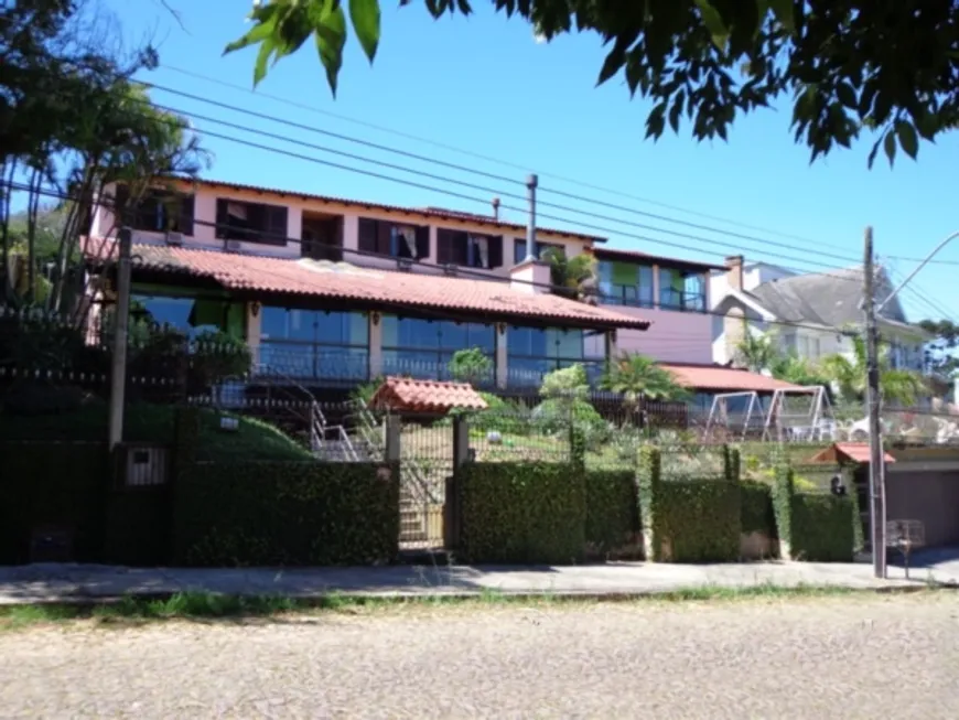Foto 1 de Casa com 5 Quartos à venda, 580m² em Vila Conceição, Porto Alegre