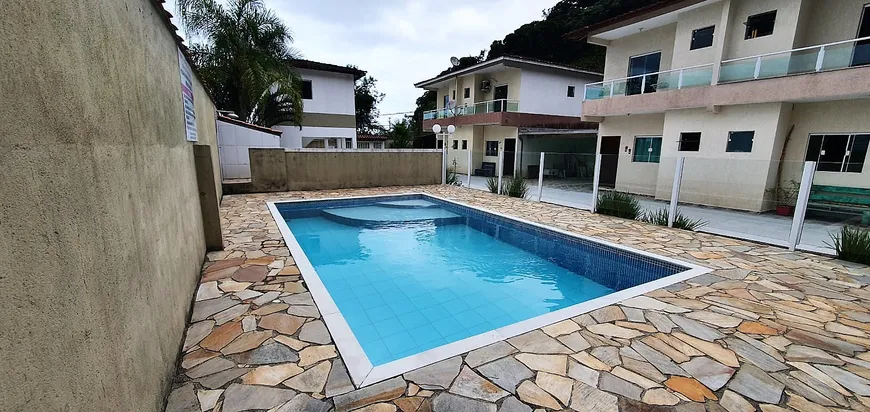 Foto 1 de Casa de Condomínio com 2 Quartos à venda, 76m² em Massaguaçu, Caraguatatuba