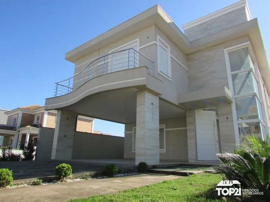 Foto 1 de Casa de Condomínio com 4 Quartos à venda, 310m² em Alphaville, Gravataí