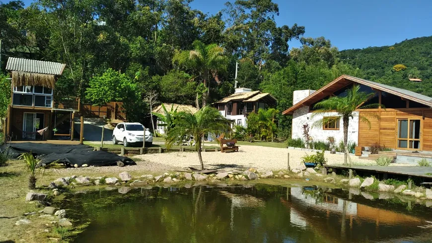 Foto 1 de Casa com 7 Quartos à venda, 2000m² em Praia do Rosa, Imbituba