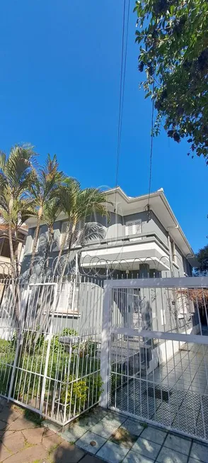 Foto 1 de Casa com 5 Quartos à venda, 482m² em Rio Branco, Porto Alegre