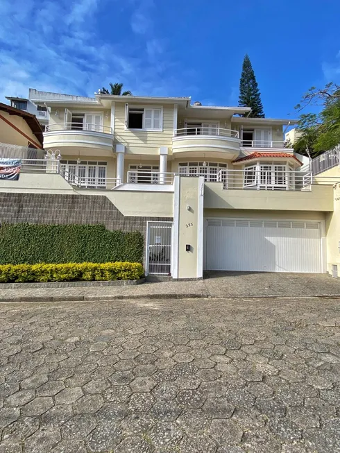 Foto 1 de Casa com 4 Quartos à venda, 308m² em Carvoeira, Florianópolis