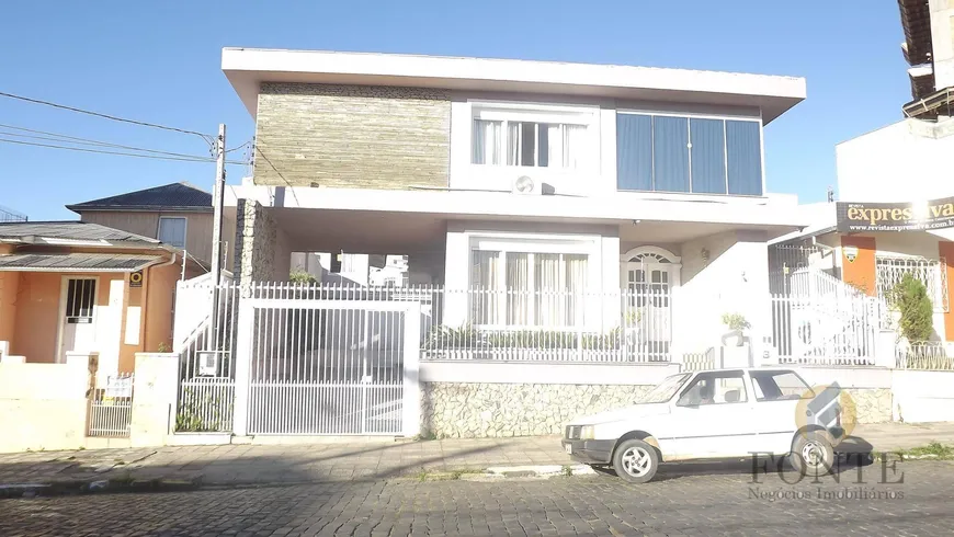 Foto 1 de Casa com 4 Quartos à venda, 379m² em Centro, Lages