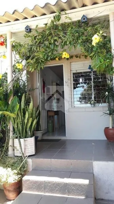 Foto 1 de Casa com 3 Quartos à venda, 104m² em Estalagem, Viamão