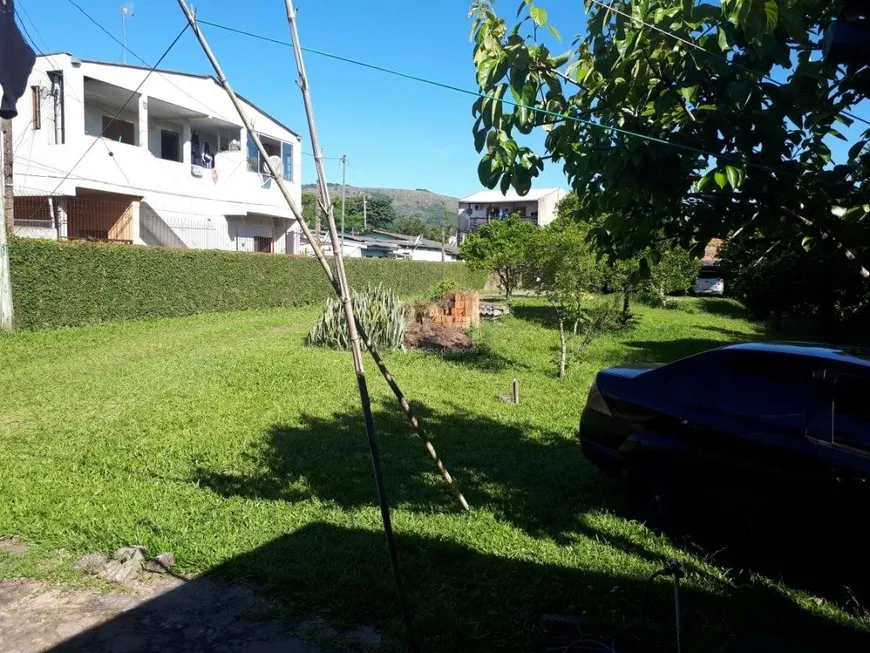 Foto 1 de Casa com 2 Quartos à venda, 70m² em Vila Nova, Porto Alegre