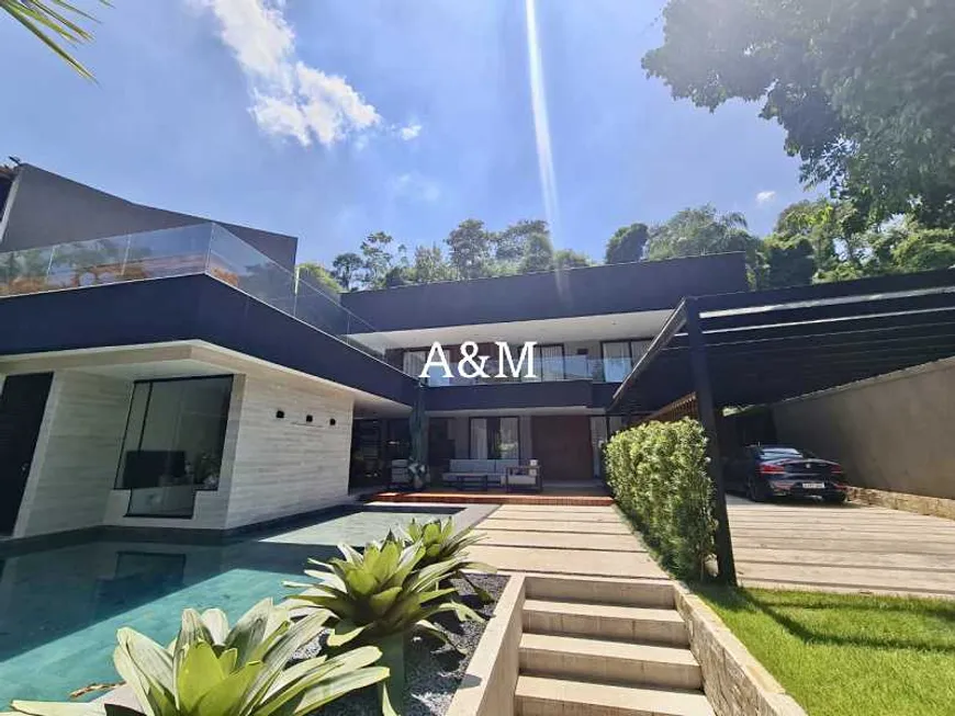 Foto 1 de Casa de Condomínio com 4 Quartos para venda ou aluguel, 650m² em Itanhangá, Rio de Janeiro
