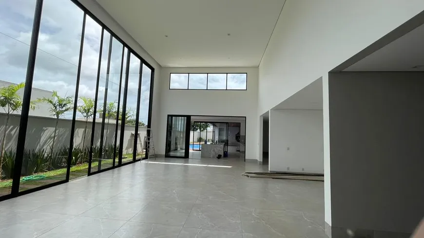 Foto 1 de Casa de Condomínio com 4 Quartos à venda, 359m² em PORTAL DO SOL GREEN, Goiânia