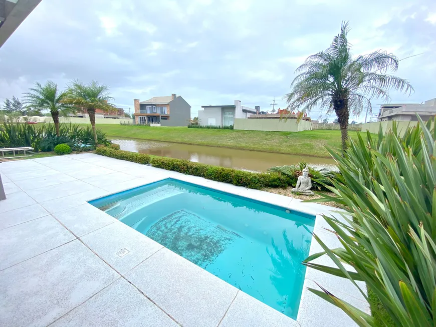 Foto 1 de Casa de Condomínio com 4 Quartos à venda, 195m² em Condominio Capao Ilhas Resort, Capão da Canoa