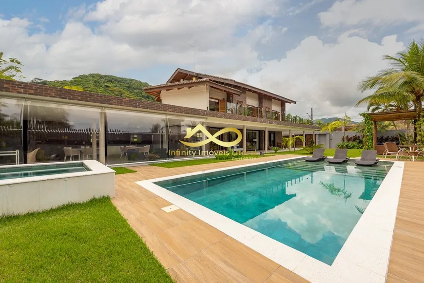 Foto 1 de Casa com 5 Quartos para venda ou aluguel, 340m² em Praia de Juquehy, São Sebastião