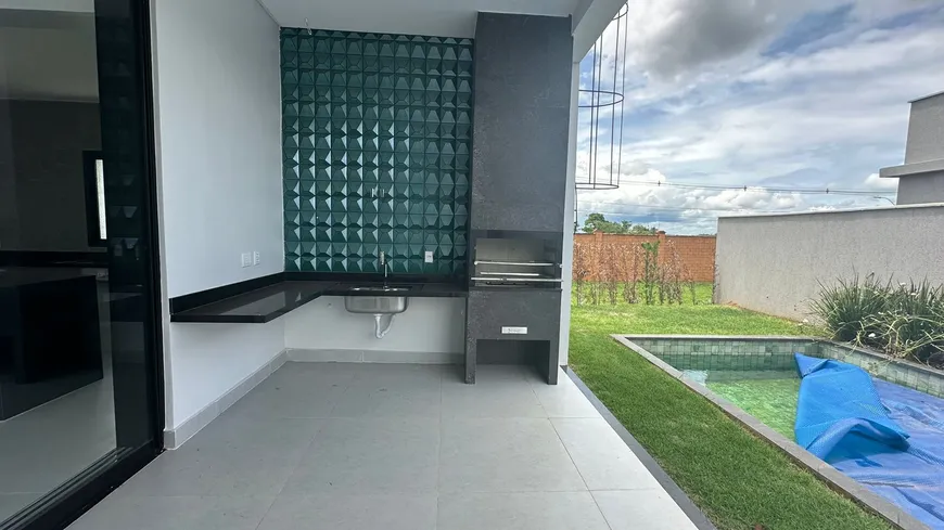 Foto 1 de Casa de Condomínio com 4 Quartos à venda, 318m² em PORTAL DO SOL GREEN, Goiânia