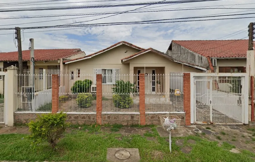 Foto 1 de Casa com 4 Quartos à venda, 100m² em Santa Fé, Porto Alegre