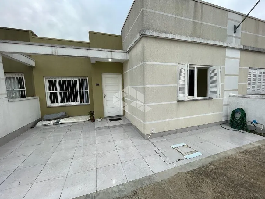 Foto 1 de Casa de Condomínio com 2 Quartos à venda, 52m² em Novo Mundo, Gravataí